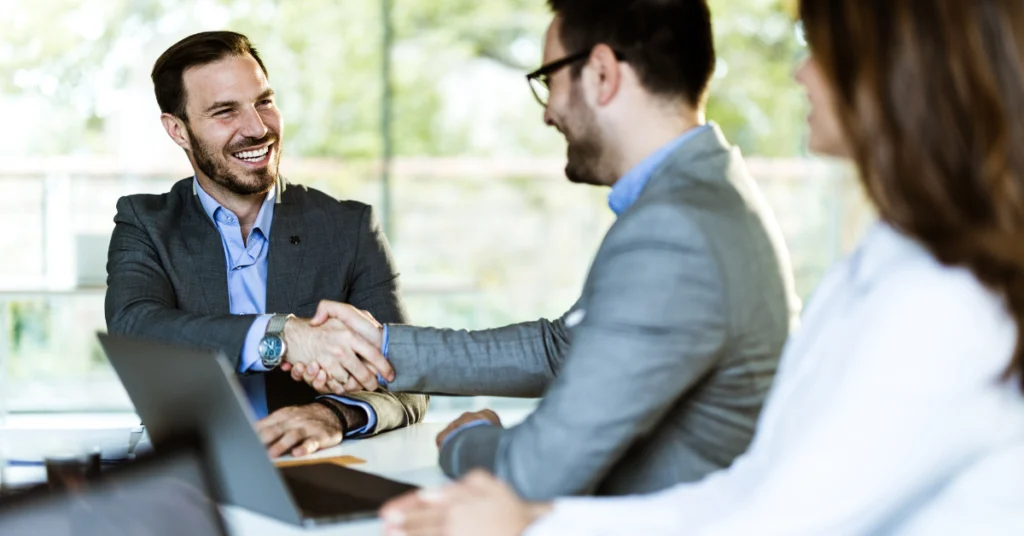 Two people shaking hands