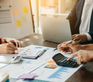 A calculator and some graphics on the table